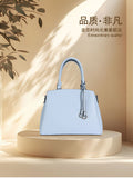Pale blue pebbled leather satchel bag
